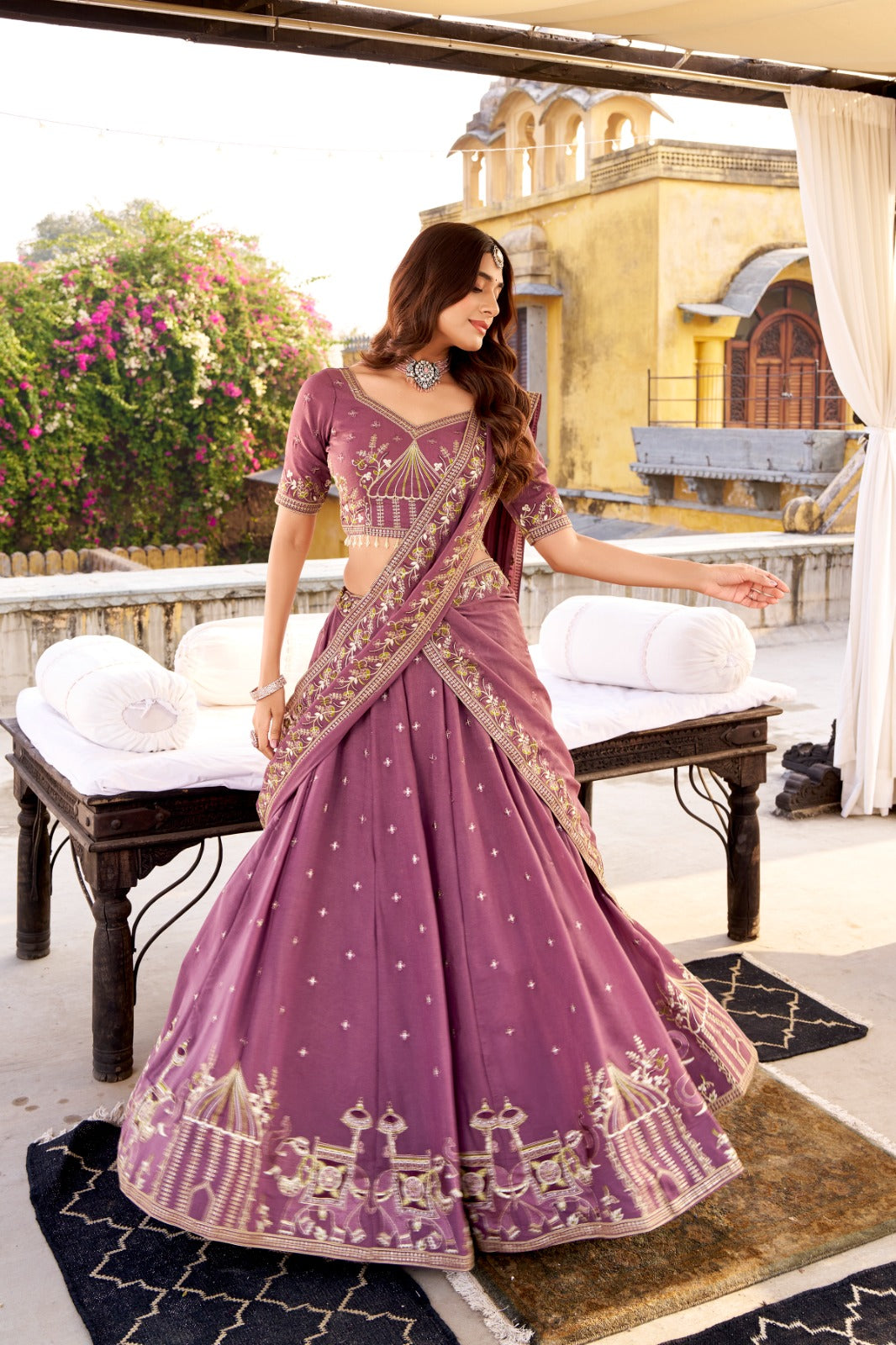 Woman in a purple saree with gold embroidery standing in an outdoor setting. | Taraa L 1457 Chocolate Crush Embroidery Worked Beautiful Lehenga Choli Collection