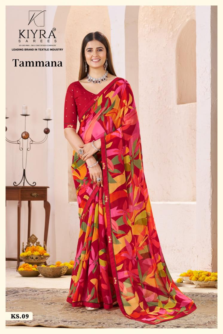 Woman wearing a colorful saree with a KIYRA label in the background | Kiyra Presents Tammana Georgette Fancy Sarees