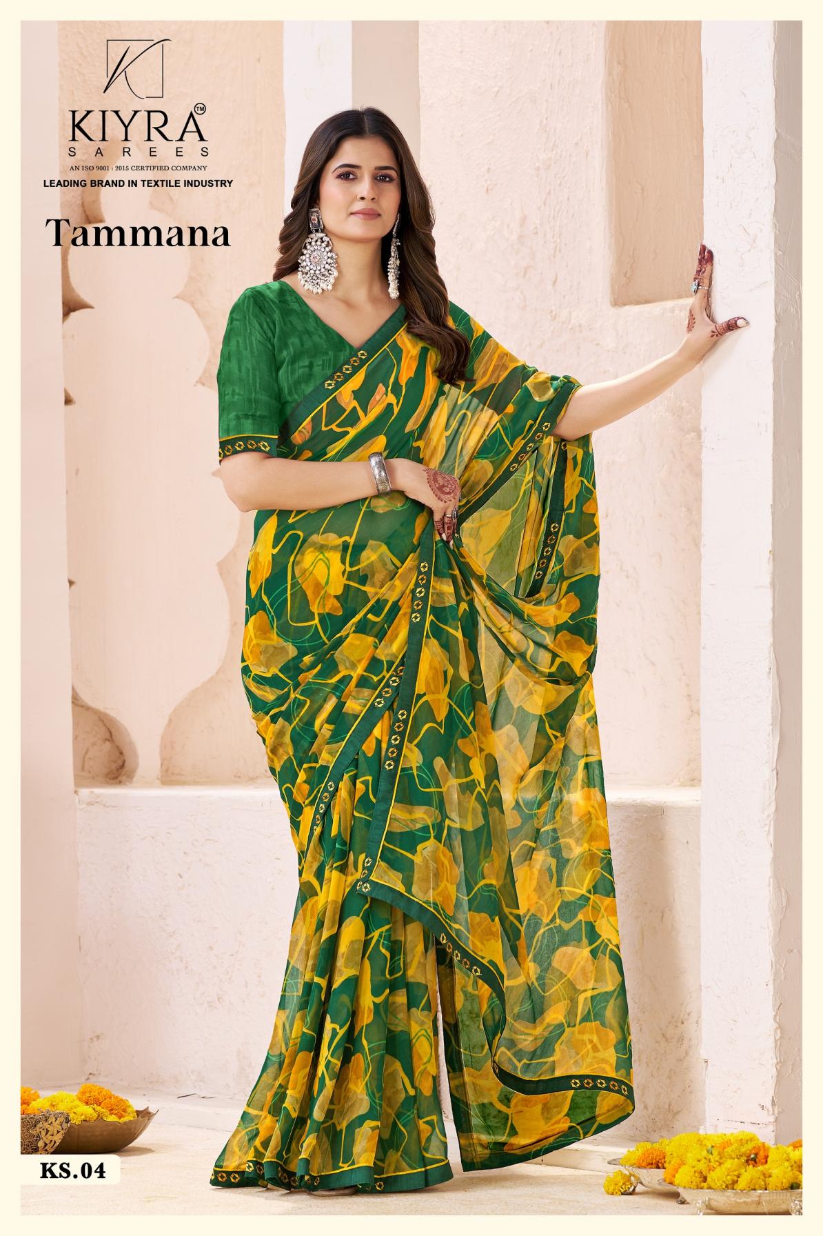 Woman wearing a green and yellow saree with KIYRA Textiles branding. | Kiyra Presents Tammana Georgette Fancy Sarees