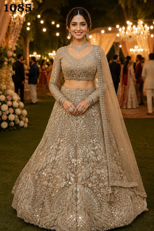 Mrudangi Griha Net With Beads Worked Lehenga Choli