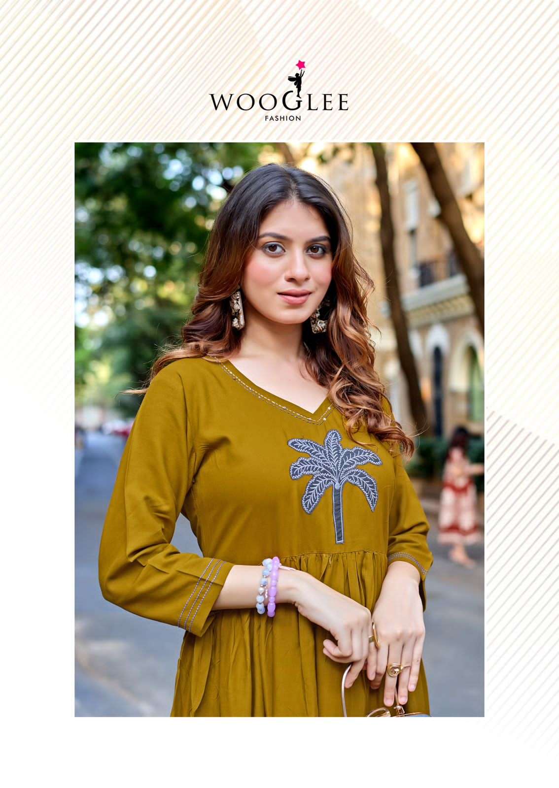 Wooglee Yamini Heavy Rayon Thread Work Stitched Kurti Gown